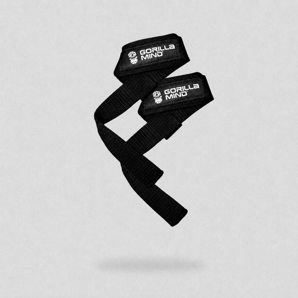 Black gym strap with Gorilla Mind logo on a light gray background
